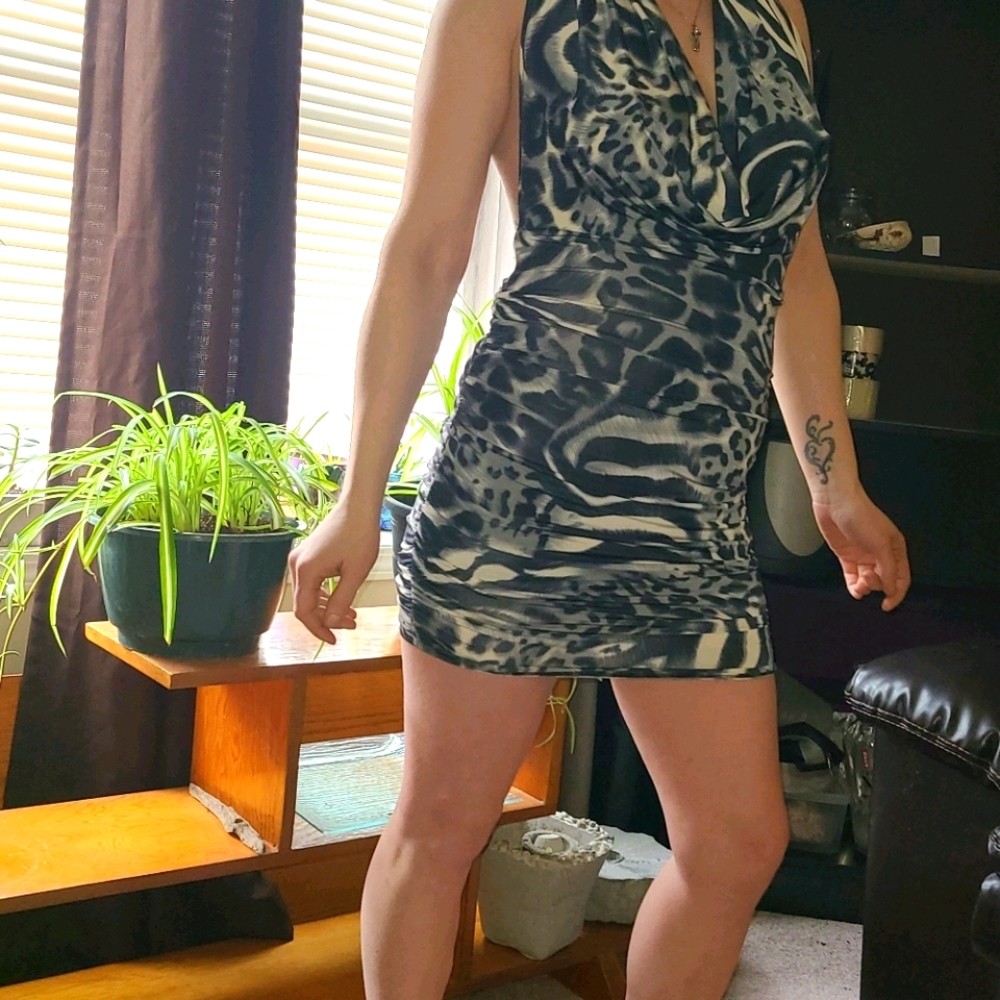 26.) Backless Grey Animal Print Dress